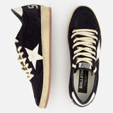 A pair of GOLDEN GOOSE Ballstar Suede Upper Sneakers featuring black suede, white laces, white star logos on the sides, and beige scuffed soles. One shoe is shown from the side, the other from above with BALLSTAR label visible on the insole.