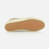 A view of the Soul-Star Suede Sneaker by GOLDEN GOOSE from the bottom, highlighting its brown rubber sole with a herringbone pattern and an off-white outer edge. The sneaker features classic taupe suede and is set against a plain white background.
