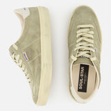 The GOLDEN GOOSE Soul-Star Suede Sneaker features a light olive green and taupe suede upper, cream laces, and matching cream soles. Displayed in side and top views against a white background, the tongue is emblazoned with “SOUL STAR,” echoing classic Golden Goose styling.