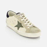 The Super Star Nappa Upper Suede Sneaker by GOLDEN GOOSE features a beige and light grey leather upper, green star detail, white laces with branding, a white sole, dark heel tab, and a softly worn vintage-inspired finish.
