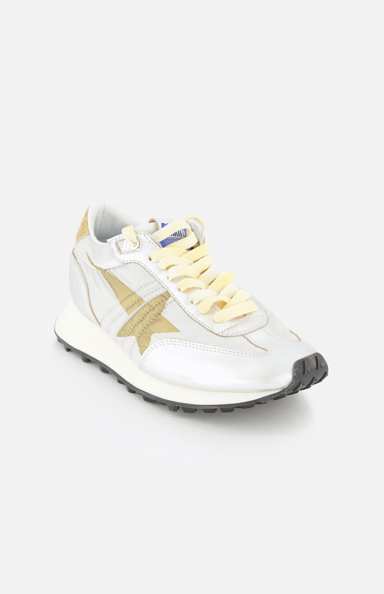 The GOLDEN GOOSE Running Marathon Sneaker features a white and tan retro design with light yellow laces, black sole, and a gold glitter heel, shown at an angle on a white background.