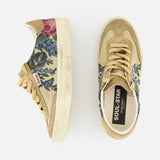 The Soul-Star Canvas Sneaker by GOLDEN GOOSE features beige suede with botanical print panels, shown from side and top views on a white background—a fresh take on classic canvas style with signature flair.