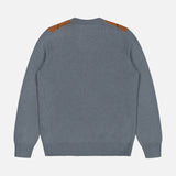 A gray long-sleeve Argyle Pattern Crewneck Sweater by GRAN SASSO is displayed flat with the back facing up. Made in Italy from virgin wool, this sweater features brown suede shoulder patches and is finished with ribbed cuffs, hem, and neckline for a refined touch.