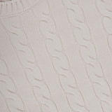 Close-up of the Cable Knit Crewneck Sweater by GRAN SASSO. This beige pullover features a classic round neckline and displays the GRAN SASSO ITALY label at the collar. The timeless braided cable knit pattern showcases its refined wool-blend construction.