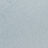 Close-up of GRAN SASSO's Knit Linen-blend Hoodie in pale blue, featuring a V-shaped neckline. A partially visible white label with black text appears at the top left.