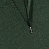 Close-up of the GRAN SASSO Quarter Zip Wool Sweater in dark green, featuring a half-zip collar. The partially open quarter zip reveals the ribbed inner collar and a glimpse of the label indicating it is made in Italy.