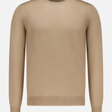 A GRAN SASSO Suede Elbow Patch Crewneck Sweater is displayed against a white background. Crafted from soft virgin wool, this tan long-sleeve sweater features classic ribbed cuffs, hem, and neckline, enhanced by distinctive suede elbow patches for a timeless design.