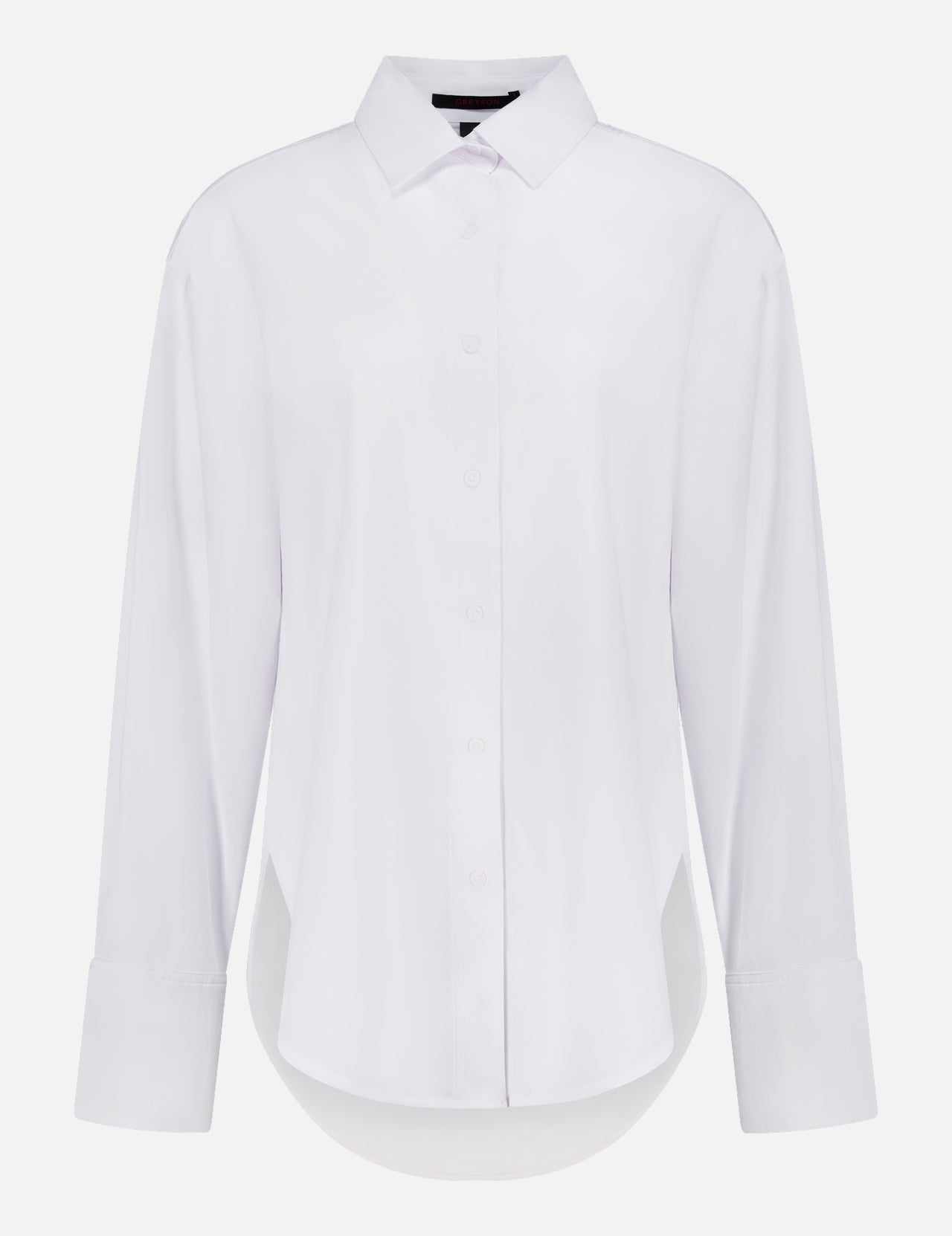 The GREYSON Ashe Button Down Shirt is a plain white, long-sleeve button-up with a classic collar and wide cuffs. This tailored summer shirt offers comfort and versatility, shown against a white background.