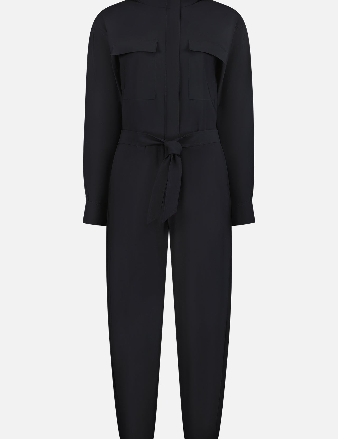 The GREYSON Phoenix Jumpsuit is a stylish black one-piece with a collared neckline, chest pockets, belted waist tie, and tapered legs, crafted from lightweight silky fabric and shown against a white background.