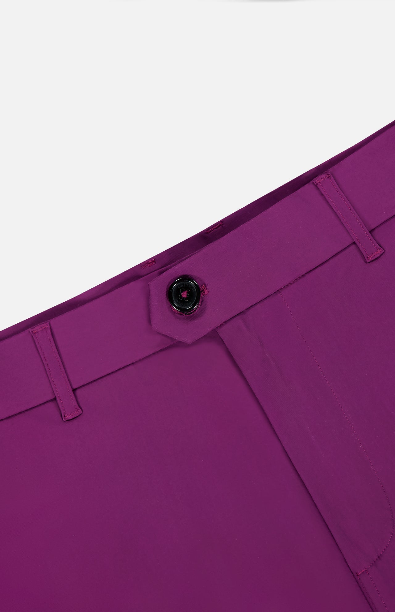 Close-up of the waistband and button of the GREYSON 8 Inch Montauk Short in magenta, highlighting belt loops and stitching detail against a plain background.