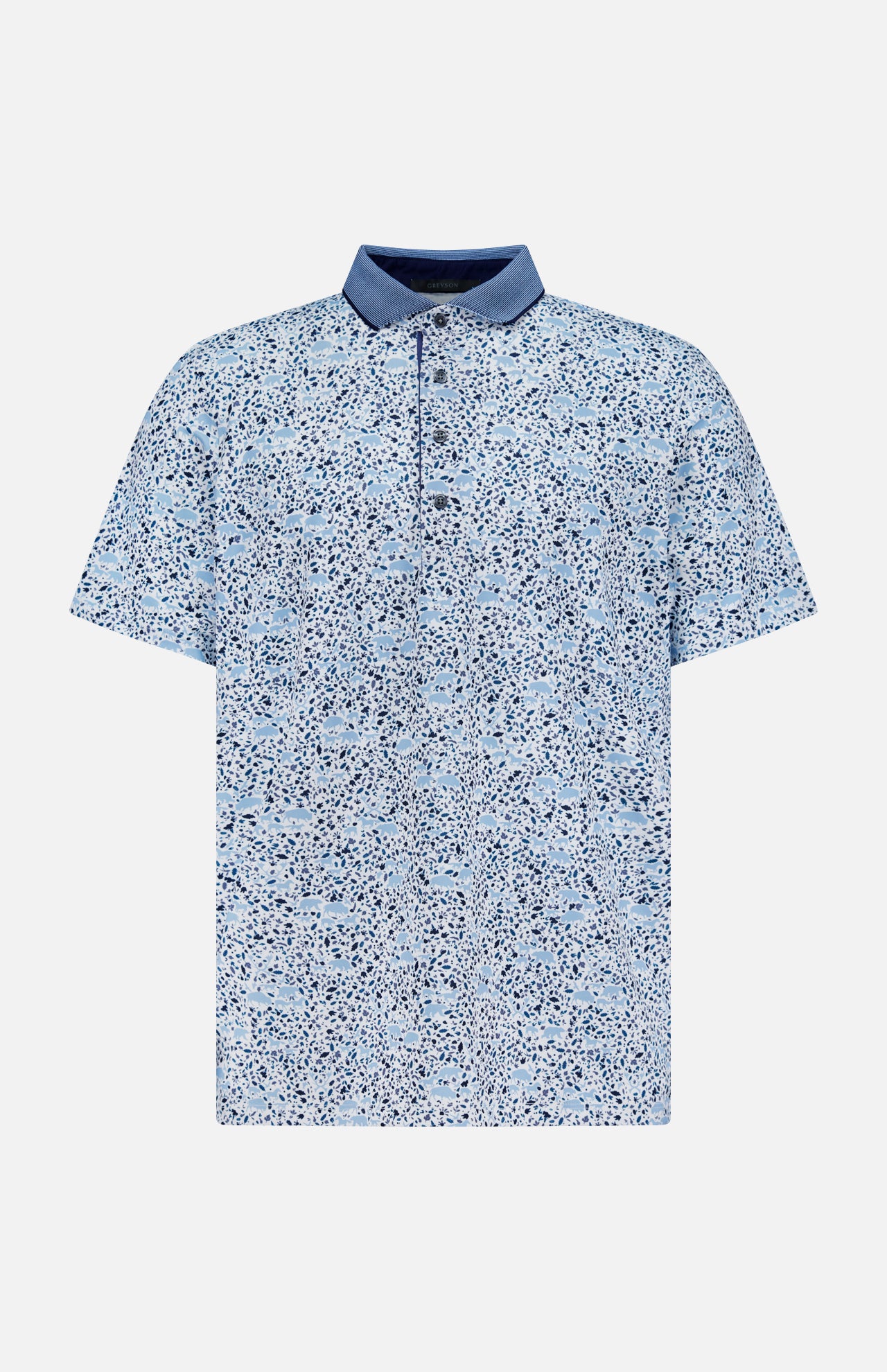 The GREYSON Buffalo Soldier Polo Shirt features a light blue, short-sleeved design with a navy collar and abstract blue and white speckled pattern. It offers a relaxed fit, button placket, moisture-wicking fabric, and built-in UV protection.