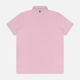 The GREYSON Crowley Polo Shirt in light pink features short sleeves, a small dark blue embroidered logo below the collar on the back, and moisture-wicking fabric for all-day comfort.