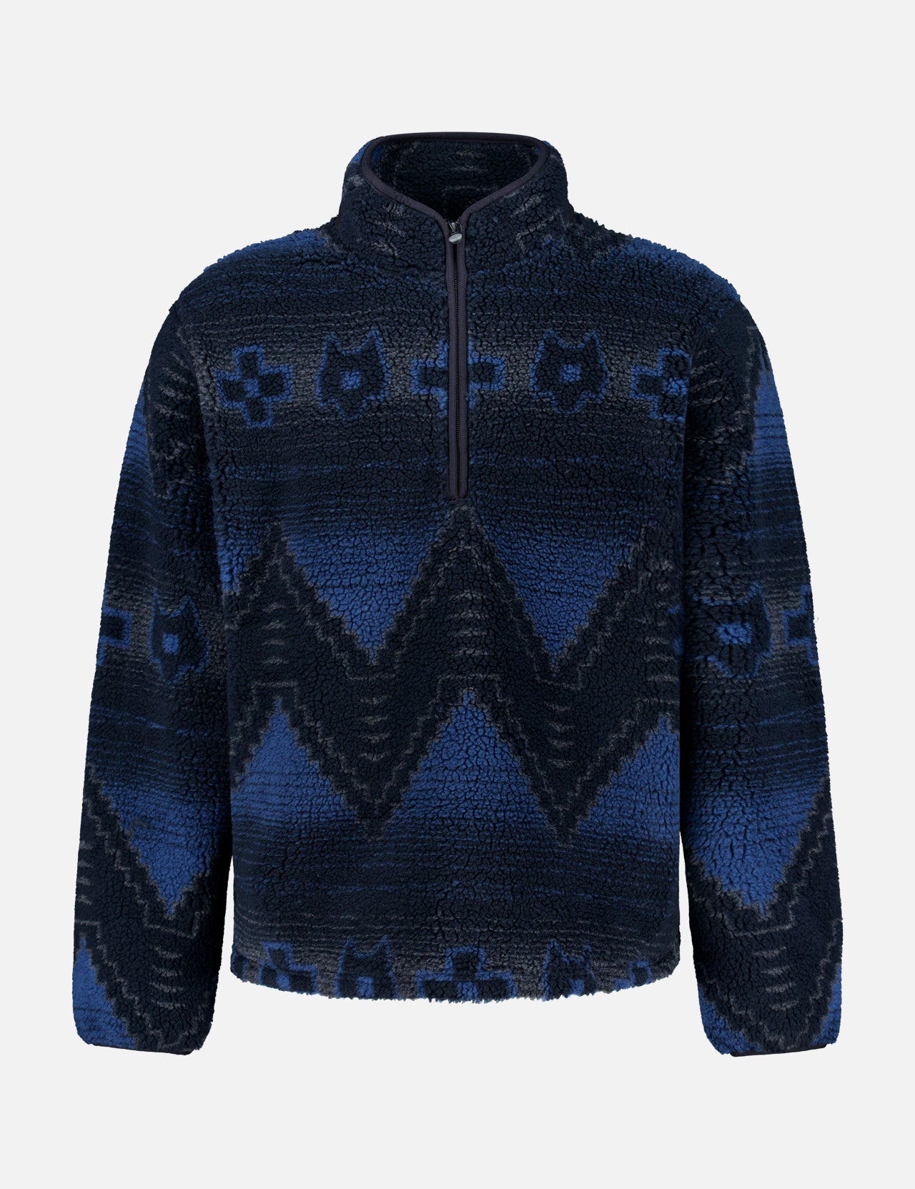 The GREYSON Guardian Sherpa Fleece Half Zip Sweater is a men’s navy blue pullover featuring a striking zigzag and abstract pattern in lighter blue shades. Designed with a quarter-zip front, long sleeves, high collar, and cozy sherpa fleece for comfort on cool days.