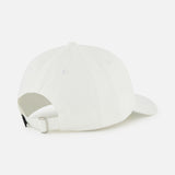 The GREYSON Icon Dad Hat in white cotton twill is shown from the back, highlighting its adjustable strap with metal buckle and curved brim. The cap is displayed on a white background.