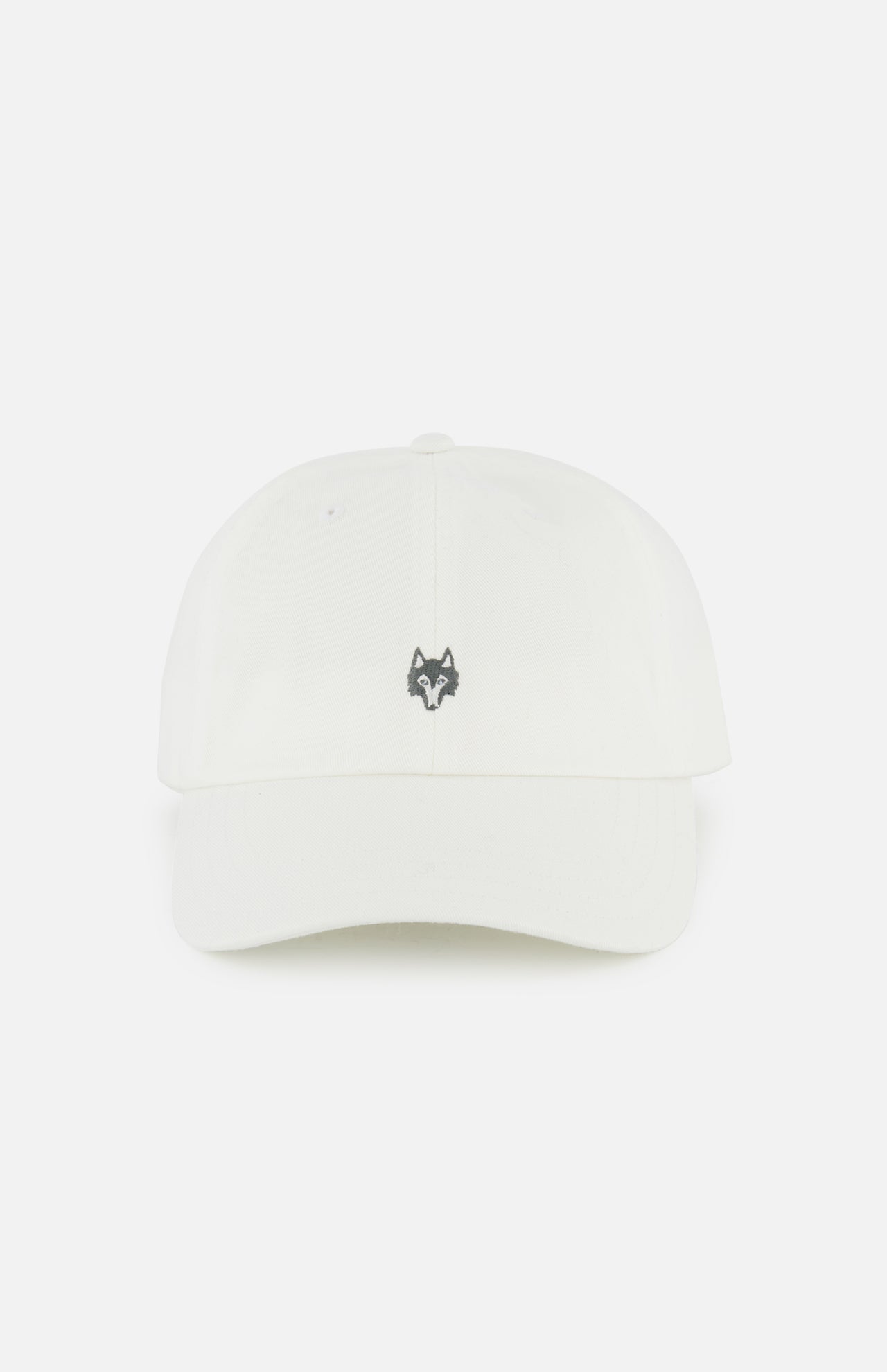 The GREYSON Icon Dad Hat is a plain white cotton twill cap with a small, embroidered gray fox head logo on the front center, shown against a white background.