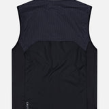 The GREYSON Micro Icon Trailwolf Hybrid Sport Vest in black and dark gray is shown laid flat with a view of the back. Featuring a subtle logo at the upper neck and “GREYSON” lettering near the bottom left hem, this sleeveless vest is an ideal lightweight outer layer for transitional weather, combining style with versatile performance.