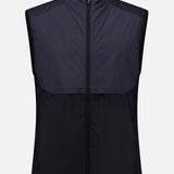 The GREYSON Micro Icon Trailwolf Hybrid Sport Vest is a sleeveless, zip-up black golf vest featuring a high collar, lightweight fabric, and subtle texture details on the upper chest and shoulders—ideal as a versatile outer layer for transitional weather—shown against a plain white background.
