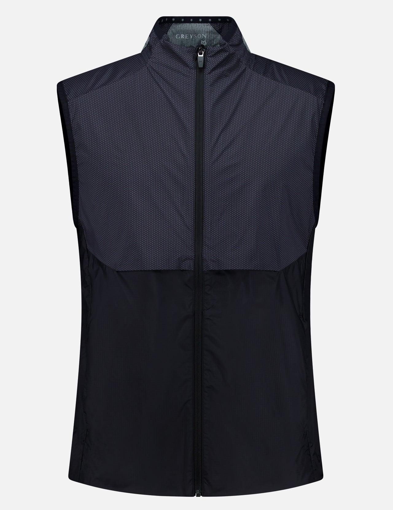 The GREYSON Micro Icon Trailwolf Hybrid Sport Vest is a sleeveless, zip-up black golf vest featuring a high collar, lightweight fabric, and subtle texture details on the upper chest and shoulders—ideal as a versatile outer layer for transitional weather—shown against a plain white background.