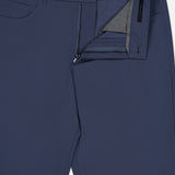 A close-up of the GREYSON Montauk 5 Pocket Pant in blue, with the zipper and button undone, crafted from premium Italian fabric and revealing part of the interior waistband and fly.