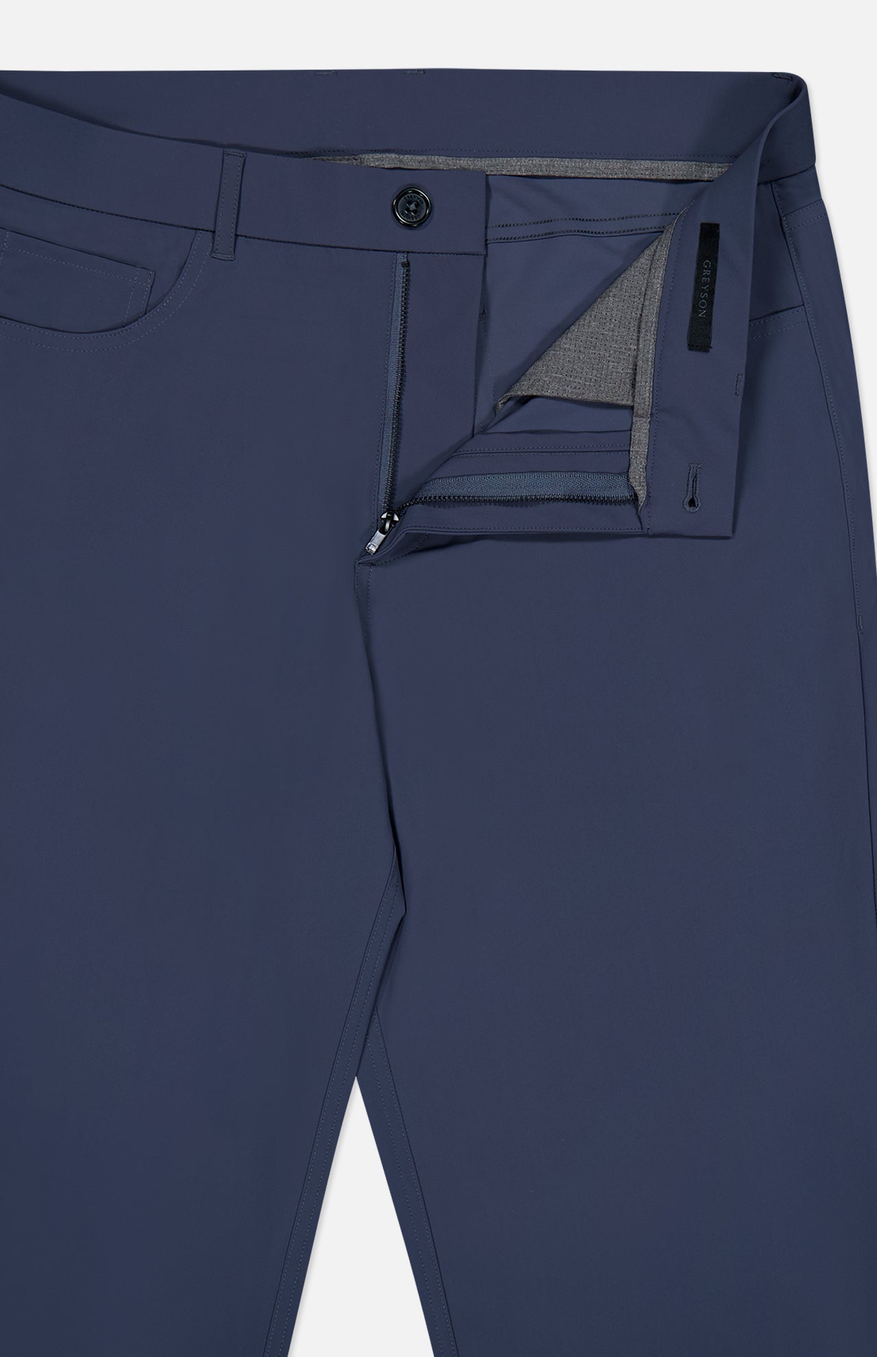 A close-up of the GREYSON Montauk 5 Pocket Pant in blue, with the zipper and button undone, crafted from premium Italian fabric and revealing part of the interior waistband and fly.