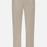Back view of the GREYSON Montauk 5 Pocket Pant in beige, featuring two back pockets, belt loops, and ‘GREYSON’ printed on the waistband; expertly crafted from premium Italian fabric with exceptional comfort and eight-way stretch.