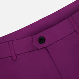 Close-up of the waist area of the GREYSON Montauk 8-Way Stretch Trouser in purple, showcasing its high-waisted fit, black button, and belt loops against a light background.