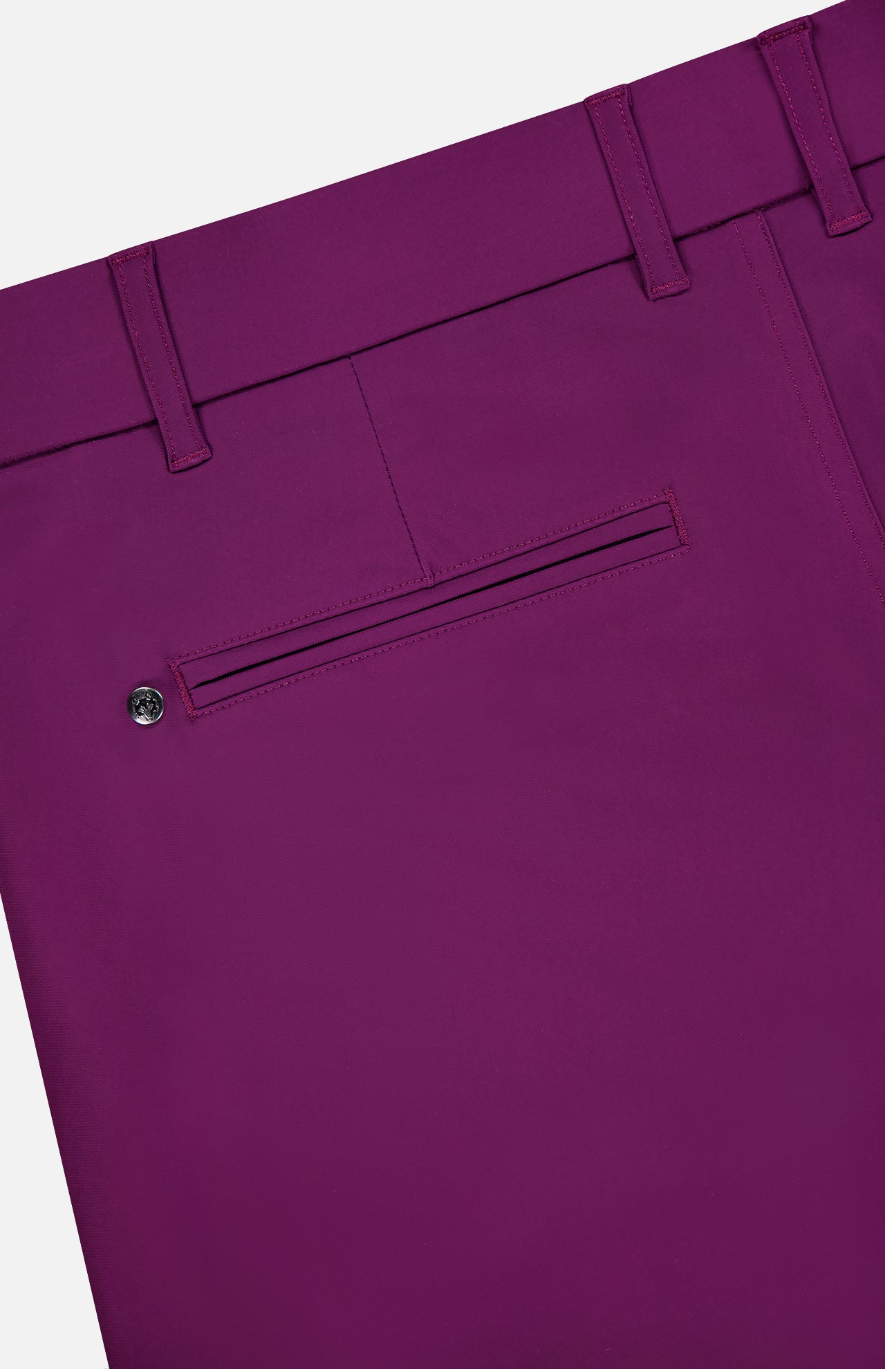Close-up of the back of GREYSON Montauk 8-Way Stretch Trouser in magenta, showing a buttoned single welt pocket and belt loops on the waistband.