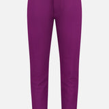 The GREYSON Montauk 8-Way Stretch Trouser features a bright purple color, straight-leg cut, front button and zip closure, belt loops, side pockets, and antimicrobial fabric. Shown on a plain white background.