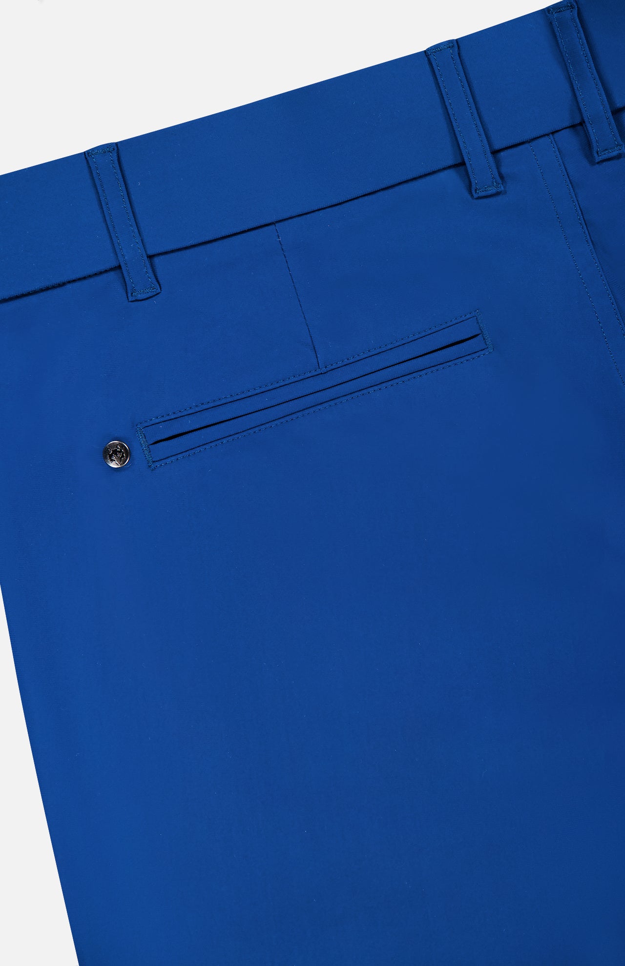 Close-up of the back of the Montauk 8-Way Stretch Trouser by GREYSON, in dark blue Italian fabric, featuring a single welt pocket with button closure and visible belt loops at the waistband.
