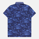 GREYSON Smoke In The Den Polo Shirt—a short-sleeve performance polo with a dark blue and light blue swirling abstract pattern, displayed flat from the back on a plain white background. Made with moisture-wicking fabric for all-day comfort.