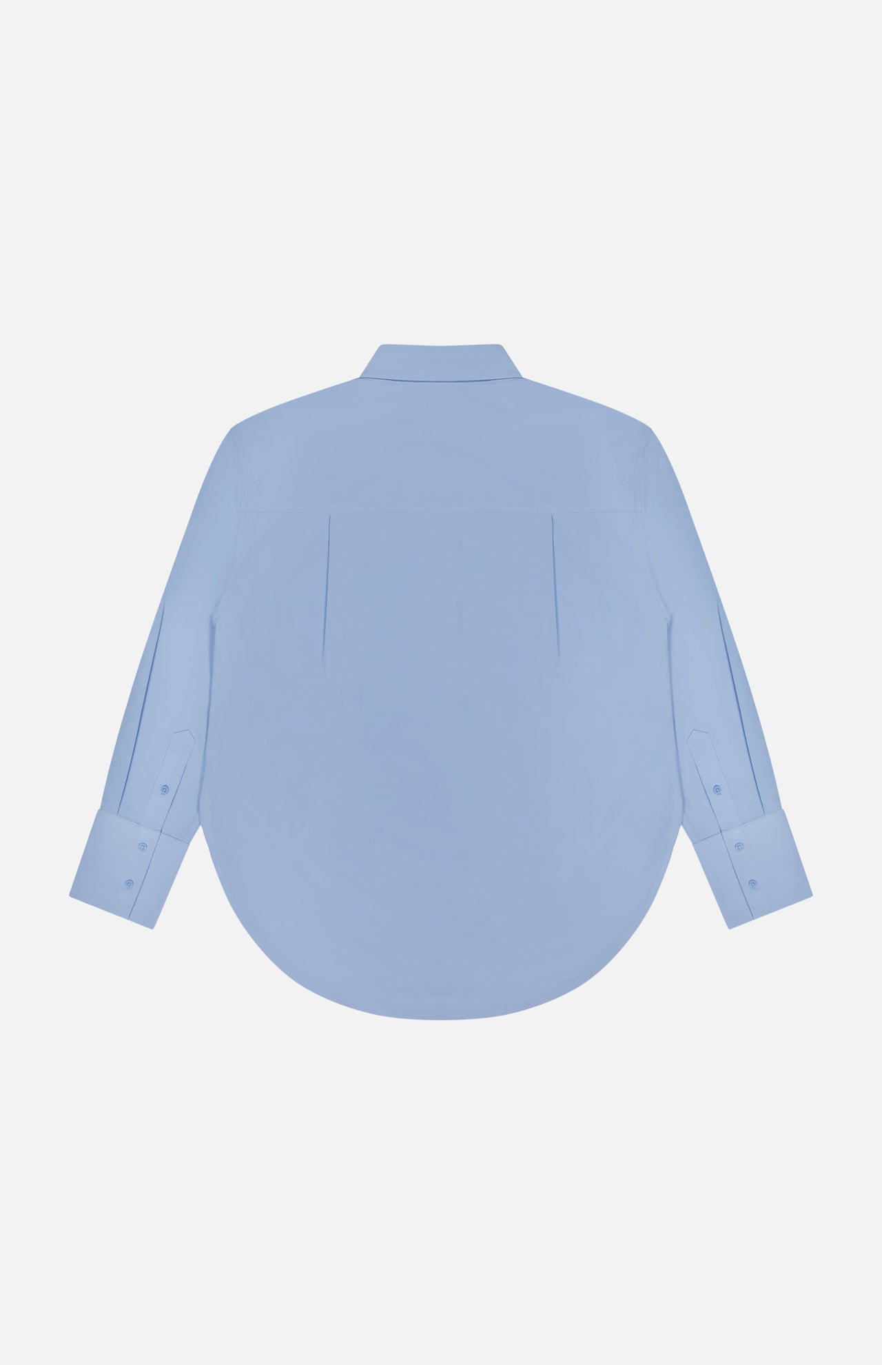 Back view of the GREYSON Ashe Button Down Shirt in light blue, featuring long sleeves, a classic collar, and curved hem. This lightweight stretch shirt is shown against a plain white background.