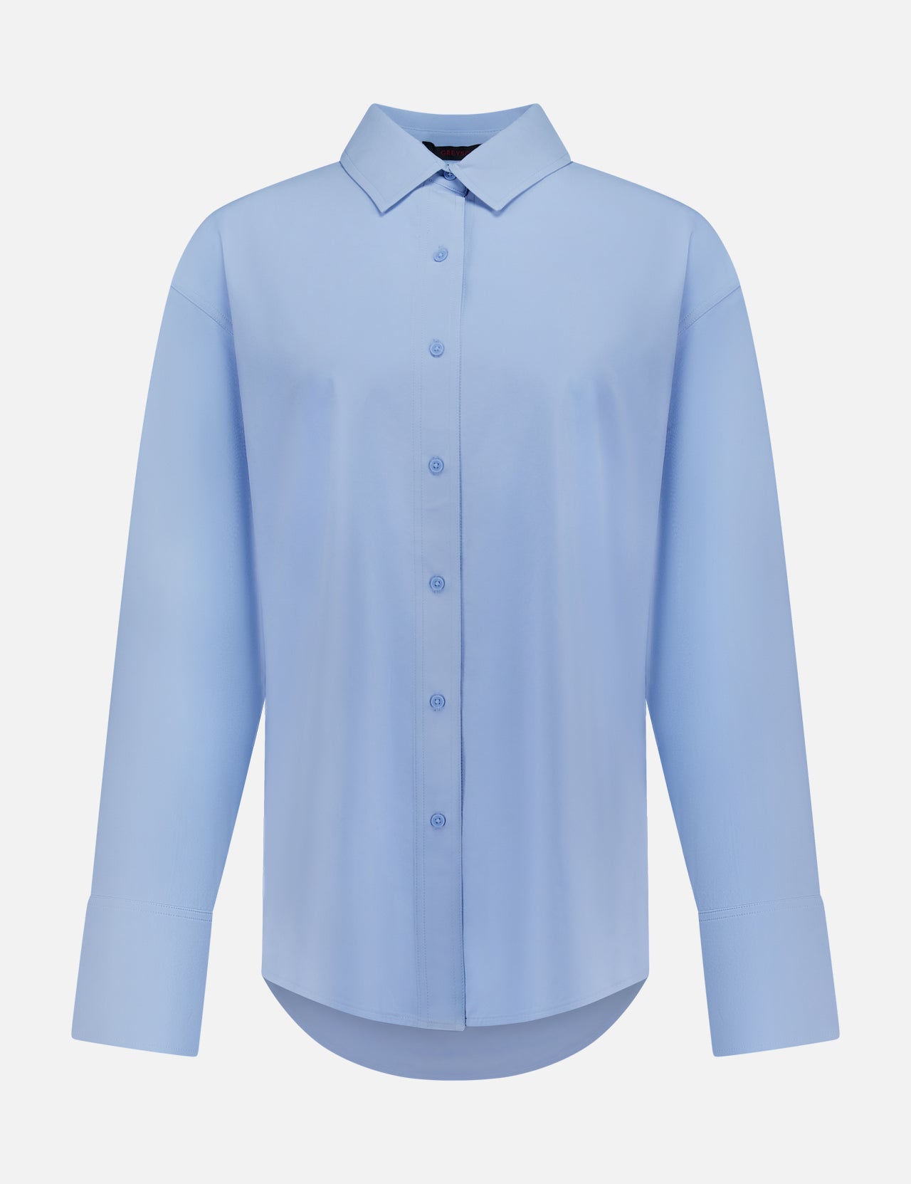 The GREYSON Ashe Button Down Shirt is a light blue, long-sleeve tailored summer shirt with a classic collar and wide cuffs, shown on a plain white background.