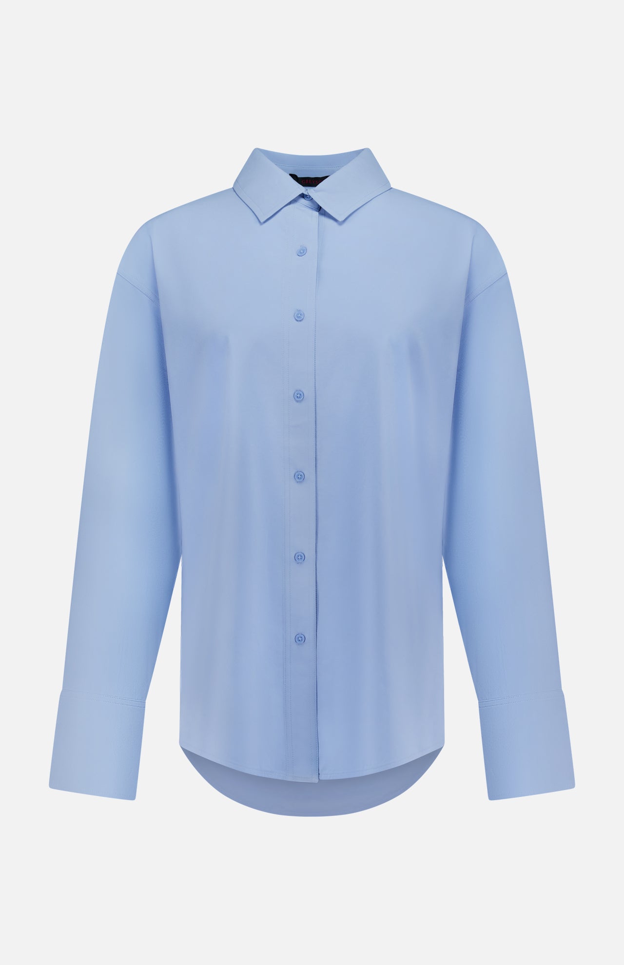 The GREYSON Ashe Button Down Shirt is a light blue, long-sleeve tailored summer shirt with a classic collar and wide cuffs, shown on a plain white background.