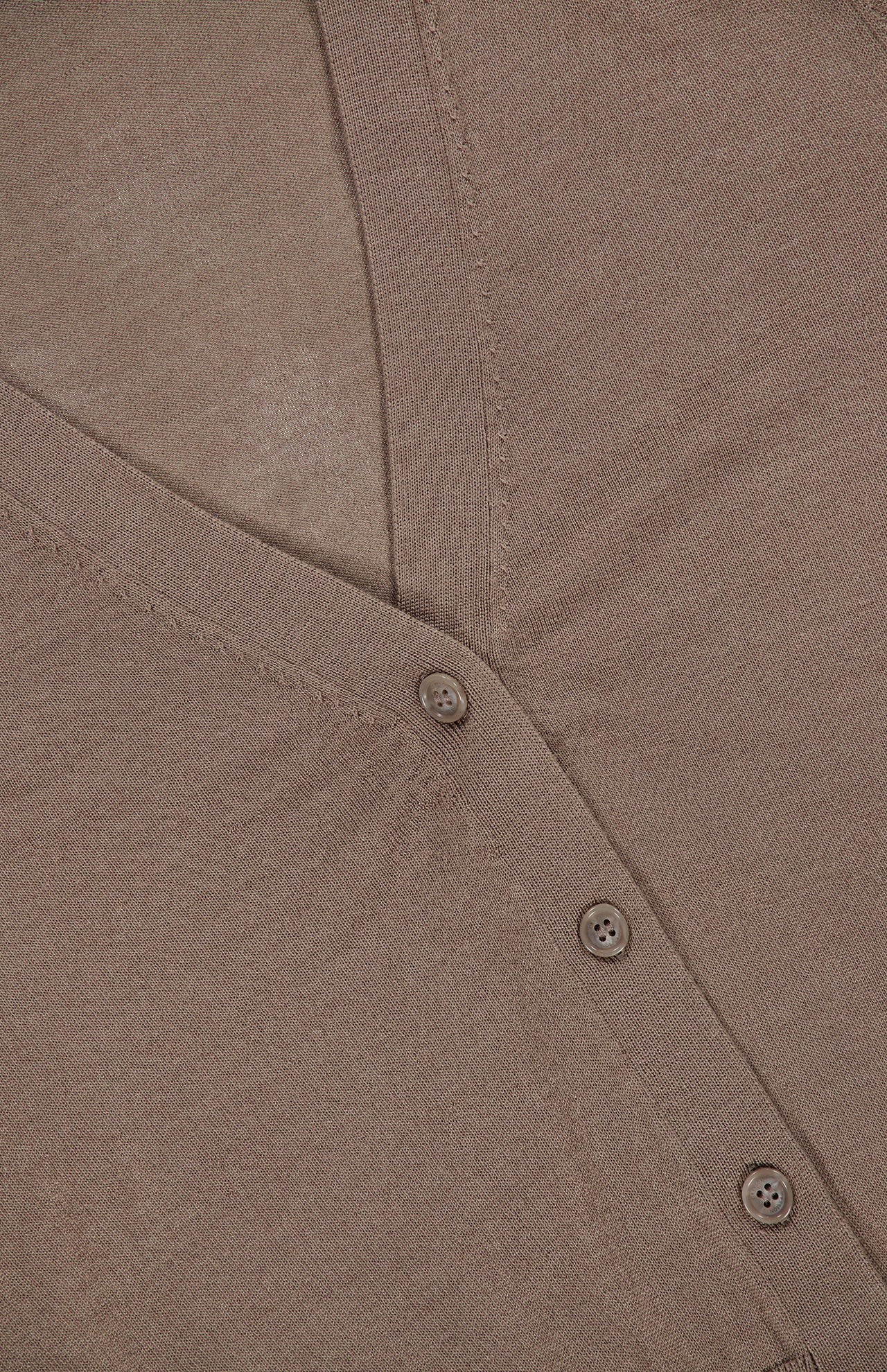 Close-up of a taupe V-neck button-down wool silk Greyson Leith Merino Cardigan Sweater.