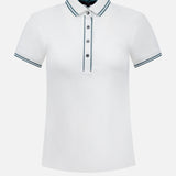 The GREYSON Slim Fit Luxe Scarlett Polo is a white performance polo featuring a collar, button placket, and thin navy stripes on the collar and sleeve cuffs. Shown on a plain white background, it delivers a modern, comfortable slim-fit style.