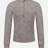 The GREYSON Midas Wolf Jacquard Halley II Quarter Zip is a light gray, long-sleeve athletic pullover with a subtle abstract pattern, high collar, and quarter-zip front, shown on a plain white background.