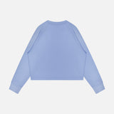The GREYSON Ojai Cropped Crewneck Sweatshirt is shown from the back against a plain white background. It features a light blue color, long sleeves, and cotton-blend fabric with a simple design and no visible logos or patterns.