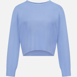 The GREYSON Ojai Cropped Crewneck Sweatshirt in light blue features a cotton blend, crew neck, ribbed cuffs, and a relaxed fit, shown against a plain white background.