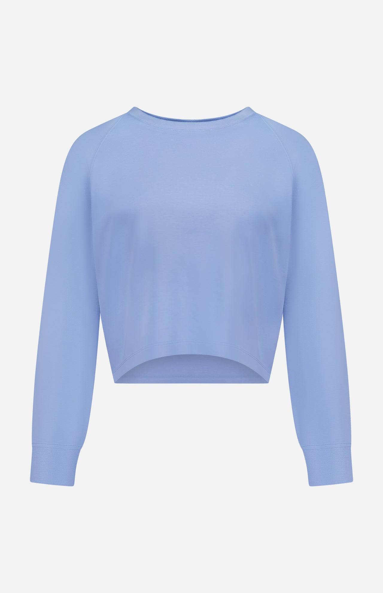 The GREYSON Ojai Cropped Crewneck Sweatshirt in light blue features a cotton blend, crew neck, ribbed cuffs, and a relaxed fit, shown against a plain white background.