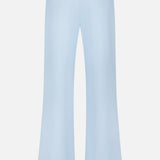 The Ojai Wide Leg Pant by GREYSON is shown from the back against a plain white background, featuring a light blue color, wide-leg silhouette, elastic waistband, and crafted from a soft cotton-blend fabric.