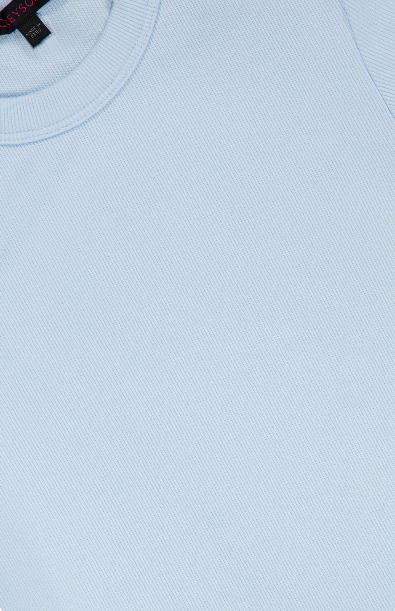 An overhead close-up of the GREYSON Orion Short Sleeve Top, featuring a light blue rib knit fabric in a slim fit with a round neckline.