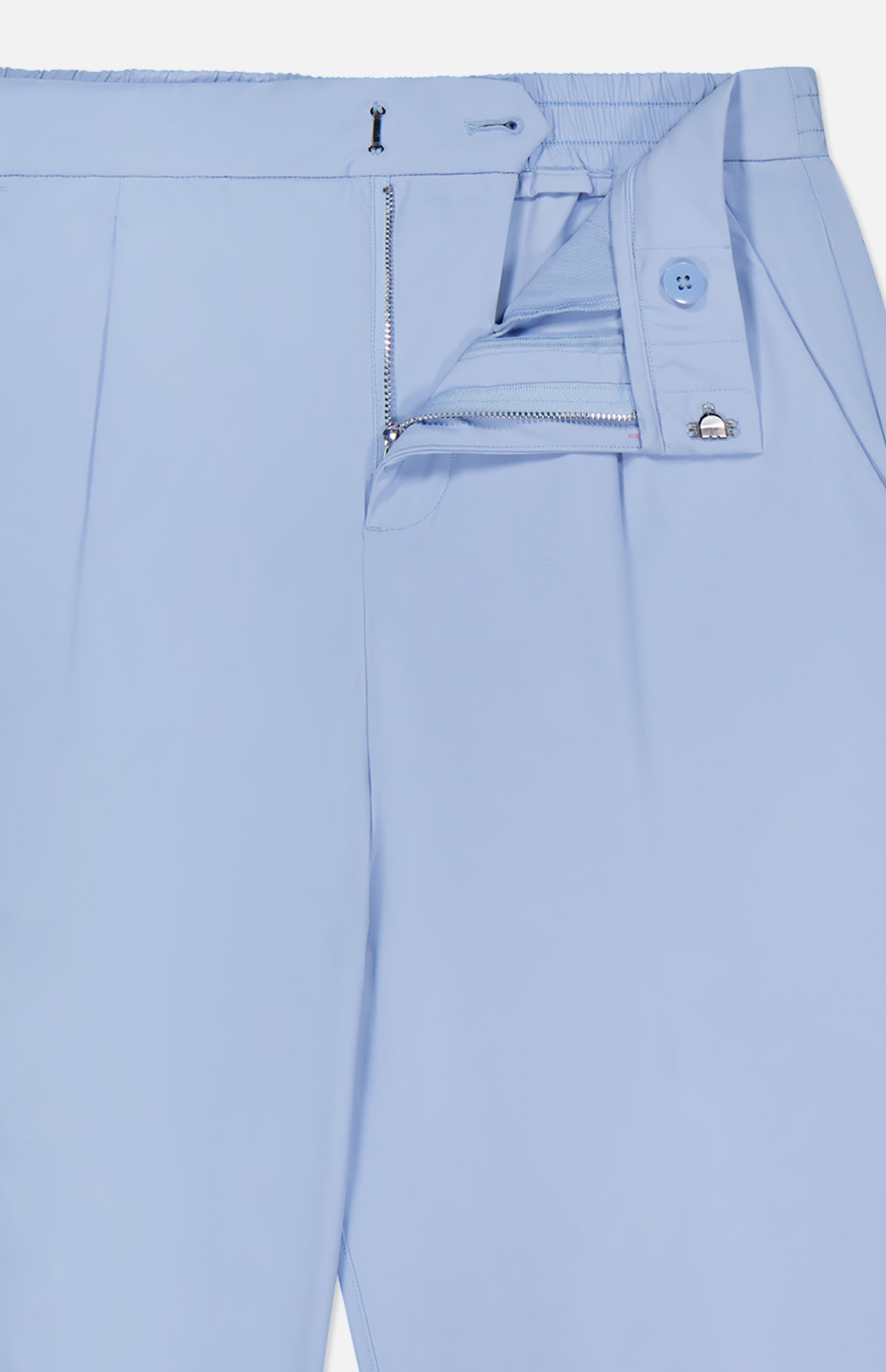 The GREYSON Phoenix Wide Leg Trouser Pant in light blue features a partially open zipper, visible button and hook closure, elastic waistband section, front pleats, and a clean, tailored design for a modern look.
