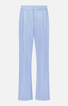 The GREYSON Phoenix Wide Leg Trouser Pant features a high waist, pleated front, and straight legs in light blue Italian-blend fabric, shown against a white background.