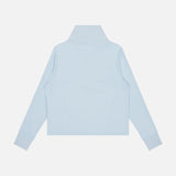 A light blue Soleil 1/2 Zip Pullover Sweater by GREYSON—crafted from premium Italian double-faced fabric with long sleeves and a collared design—is laid flat with the back facing up, set against a plain white background.