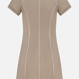 Back view of a tan Soleil Mini Polo Dress by Greyson, crafted from Italian performance fabric with a white collar and vertical piping details.