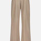 Beige Wide Nylon Pant with Drawcords featuring an elastic drawstring waistband, wide legs, and adjustable toggle hems.