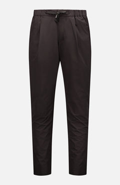 HERNO Laminar Trousers showcase Sartorial Engineering with a drawstring waist, elastic band, and side pockets. Made from smooth, slightly shiny fabric, they are pictured against a white background.