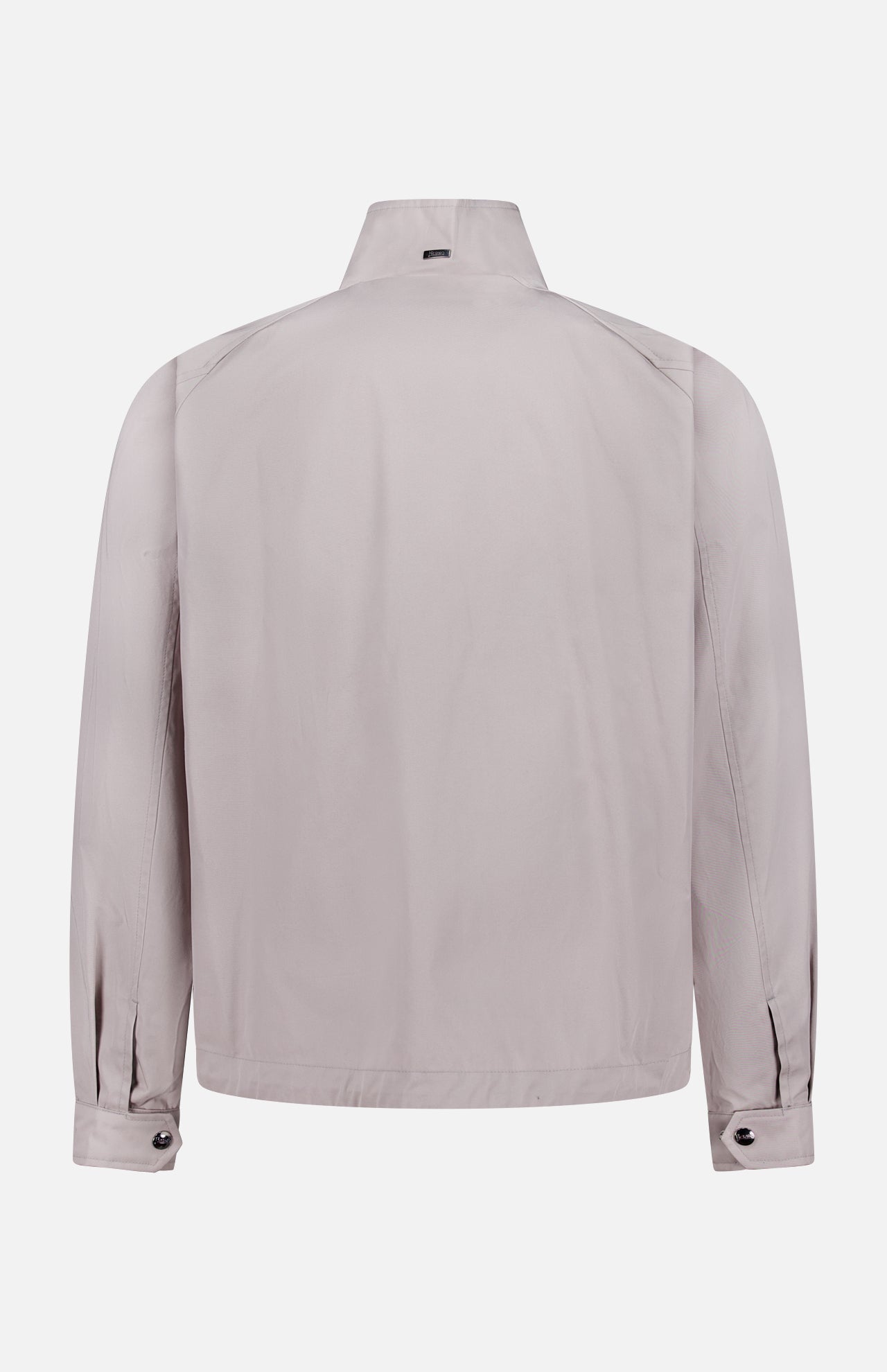 The HERNO Dean Cotton Bomber Zip Jacket in light gray is shown from the back, featuring a high collar, long sleeves with buttoned cuffs, and a straight hem. Its minimalist cotton design makes it ideal men's spring outerwear with no visible logos or patterns.