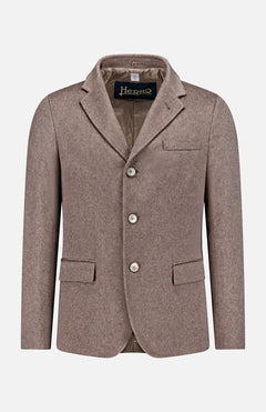 The HERNO Pure Cashmere Blazer Jacket is a light brown, single-breasted piece with notched lapels, three buttons, chest pocket, two front flap pockets, and a removable padded bib shown against a plain white background.