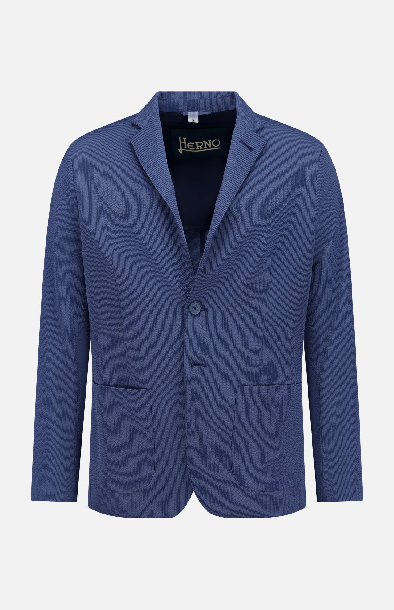 The HERNO Seersucker 2 Button Blazer is a blue, single-breasted style with notch lapels and two patch pockets, ideal for formal events. The brand label appears inside the collar, shown on a plain white background.